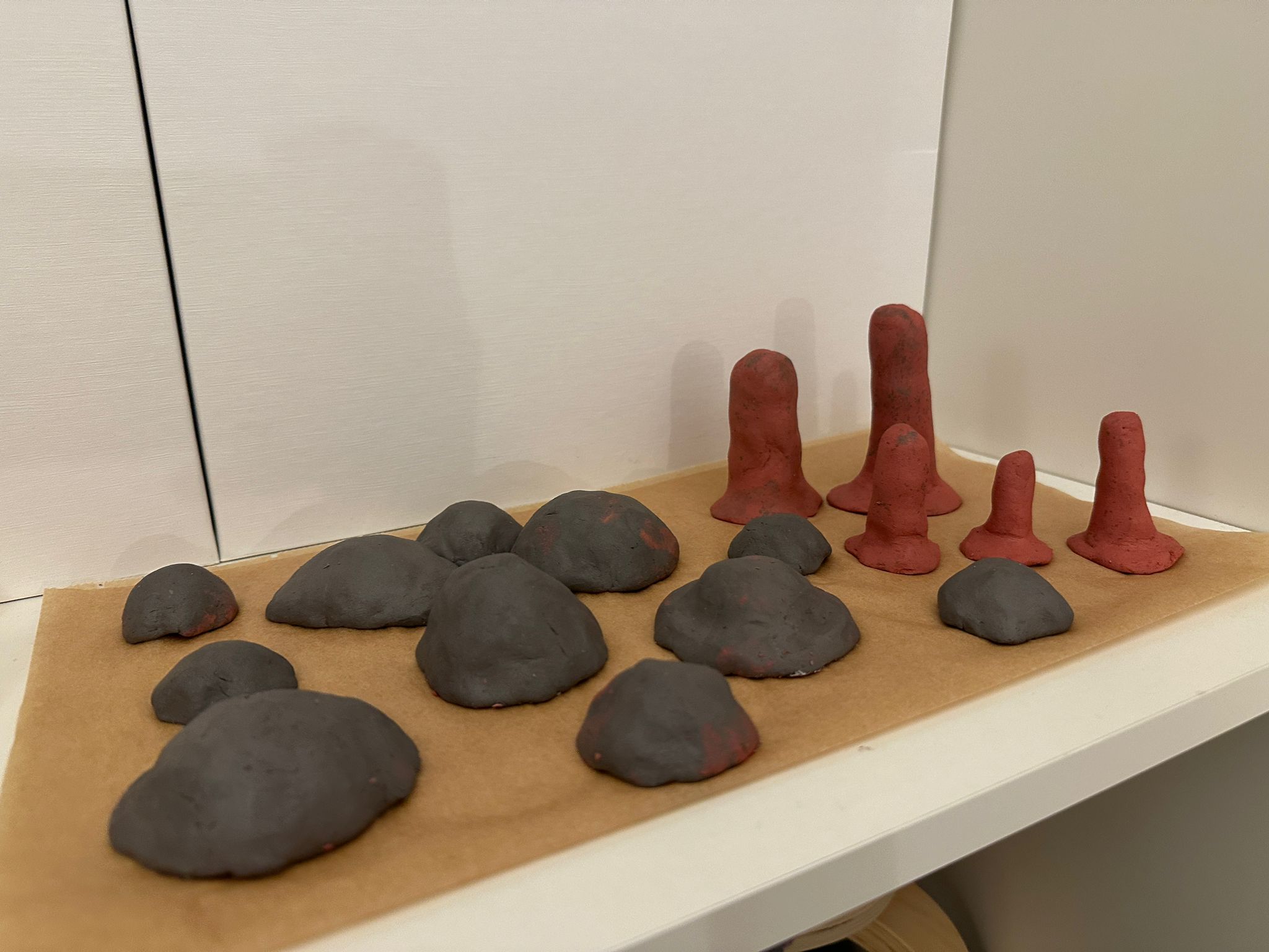 Clay mold for shaping the baby mushrooms